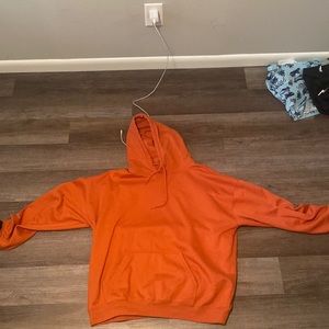 Orange Hoodie With Graphic